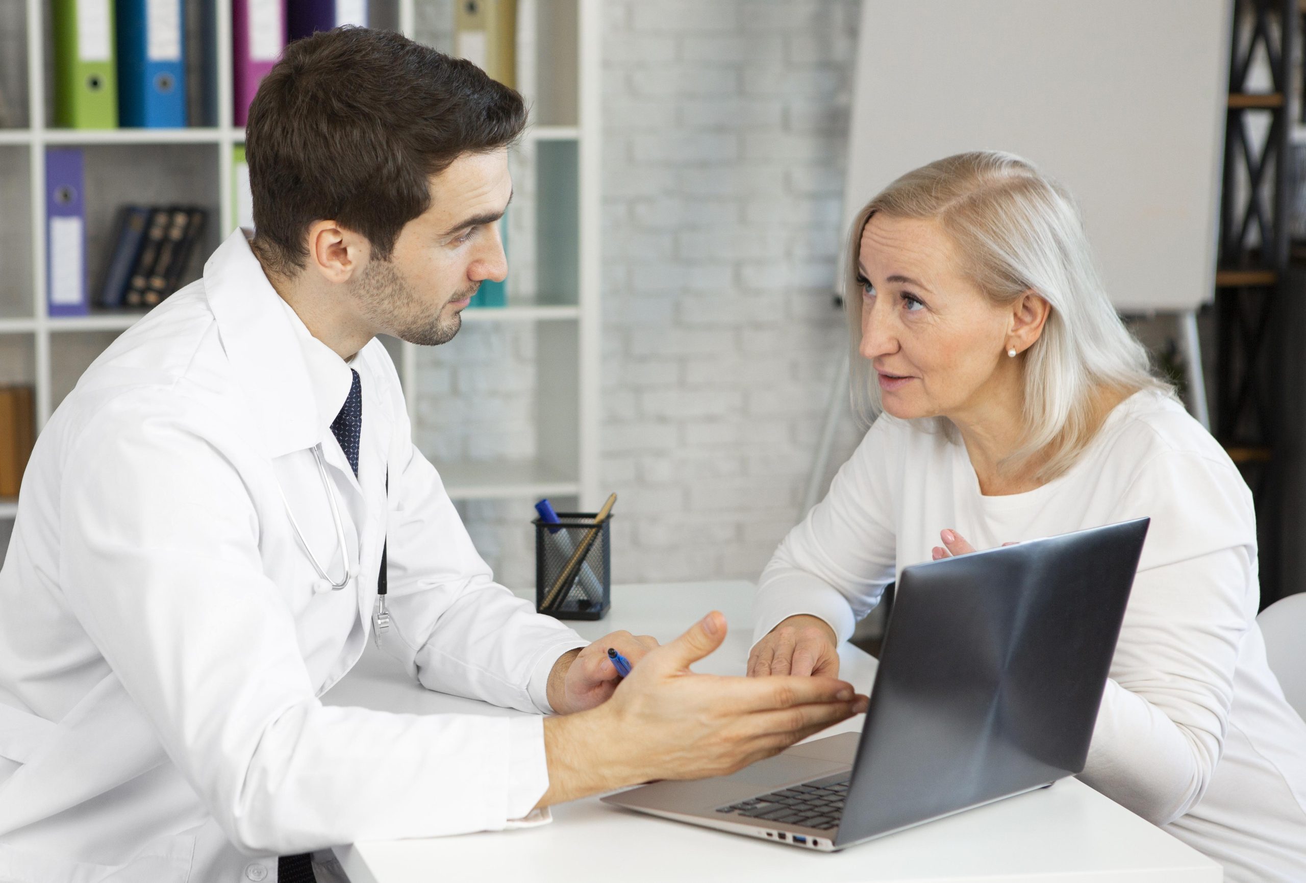 Provider discussing an anti-aging plan with a patient